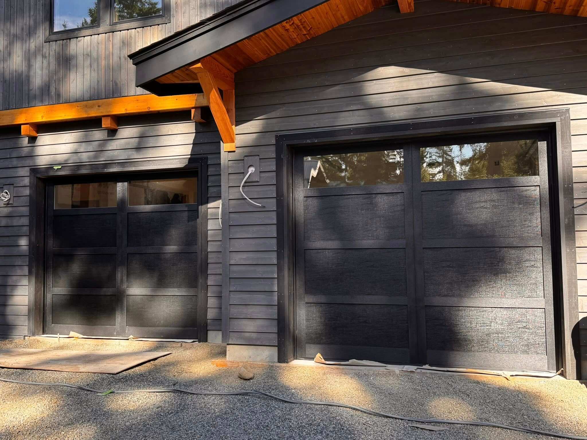 black house with black garage door
