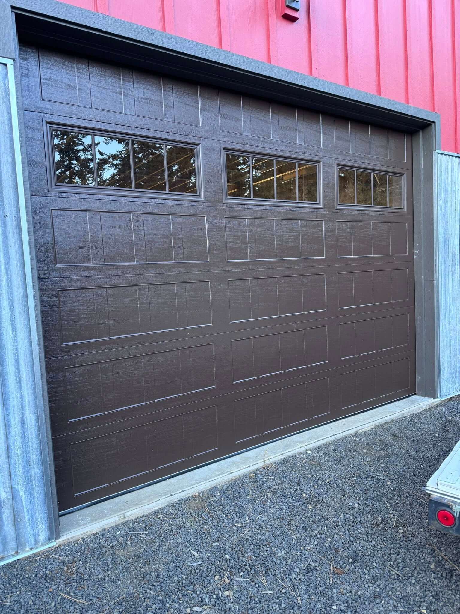 a red house with a garage door