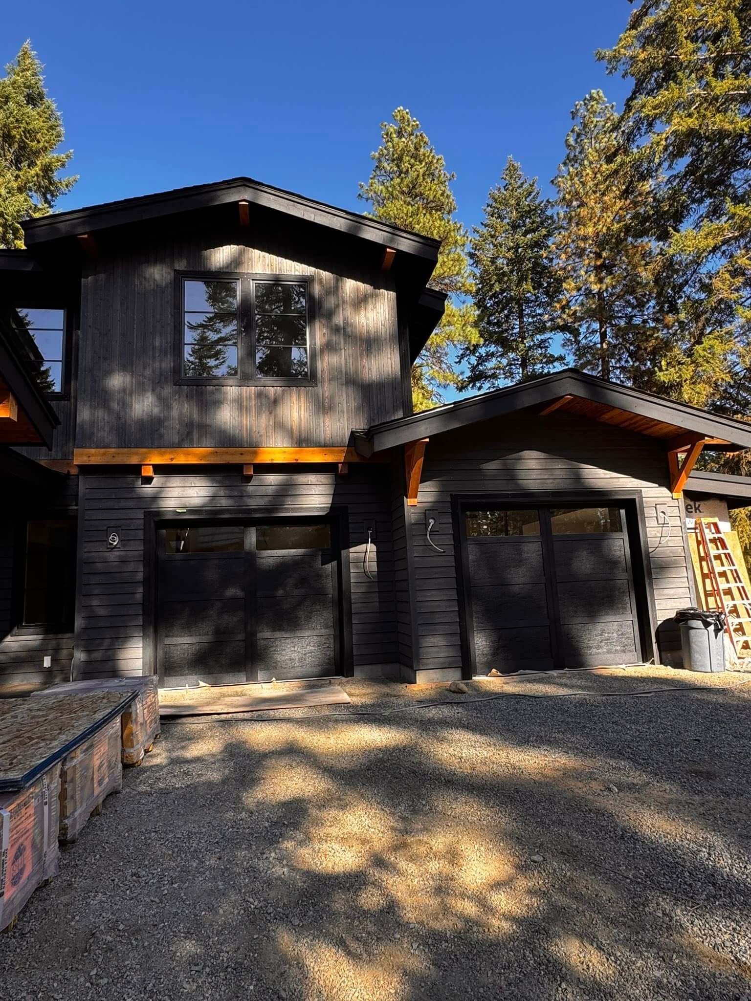 black house with black garage door