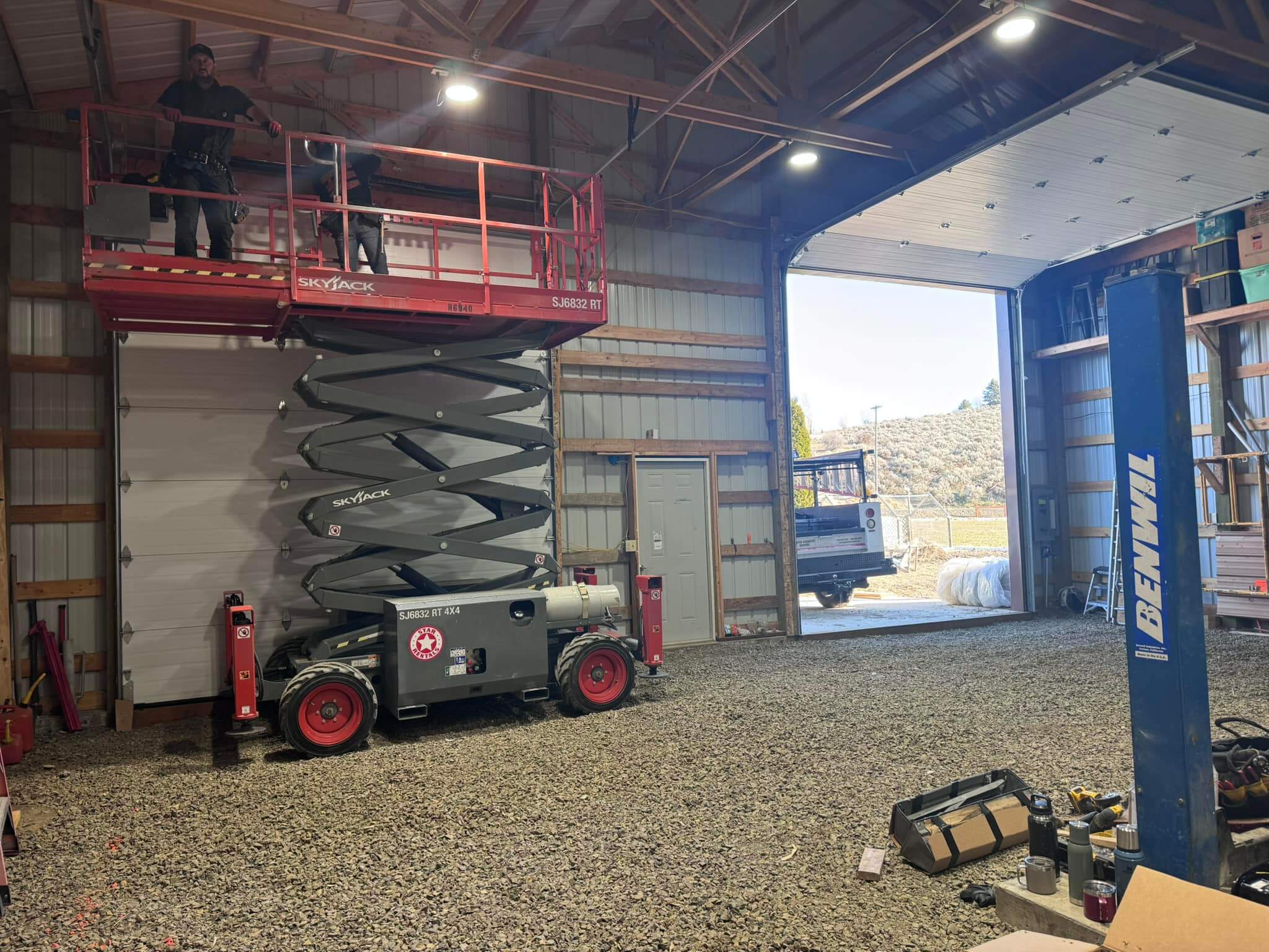 davis garage doors with skyjack lift inside garage