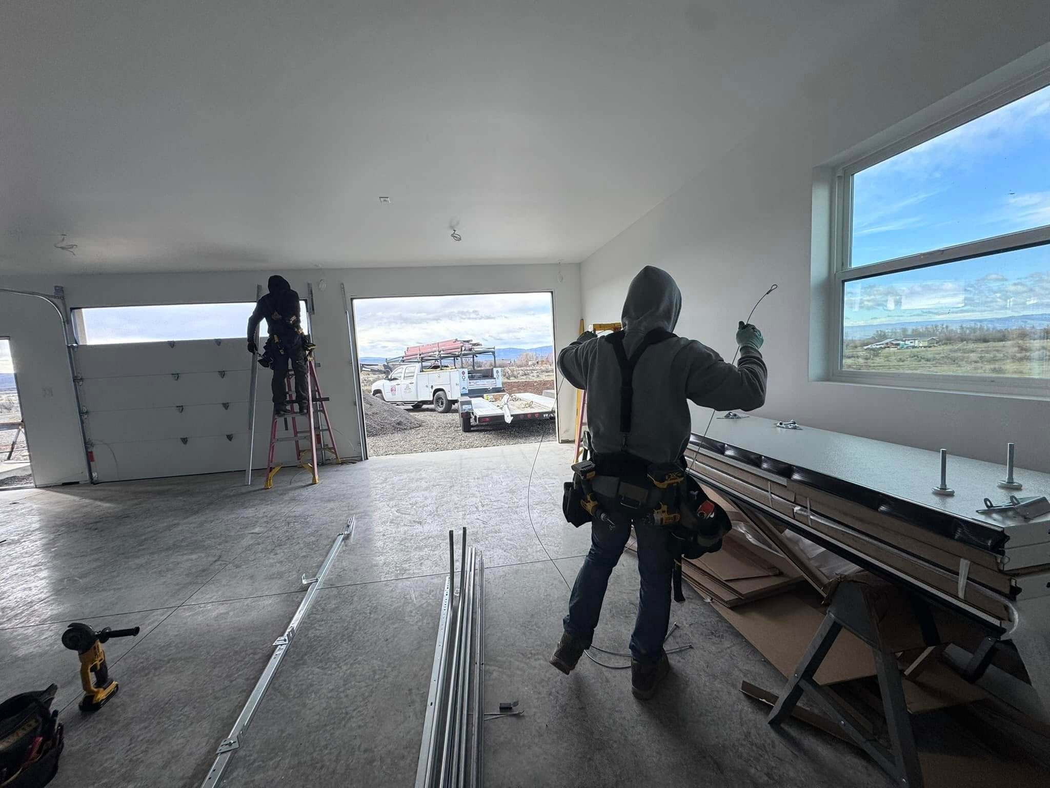 guys installing a garage door