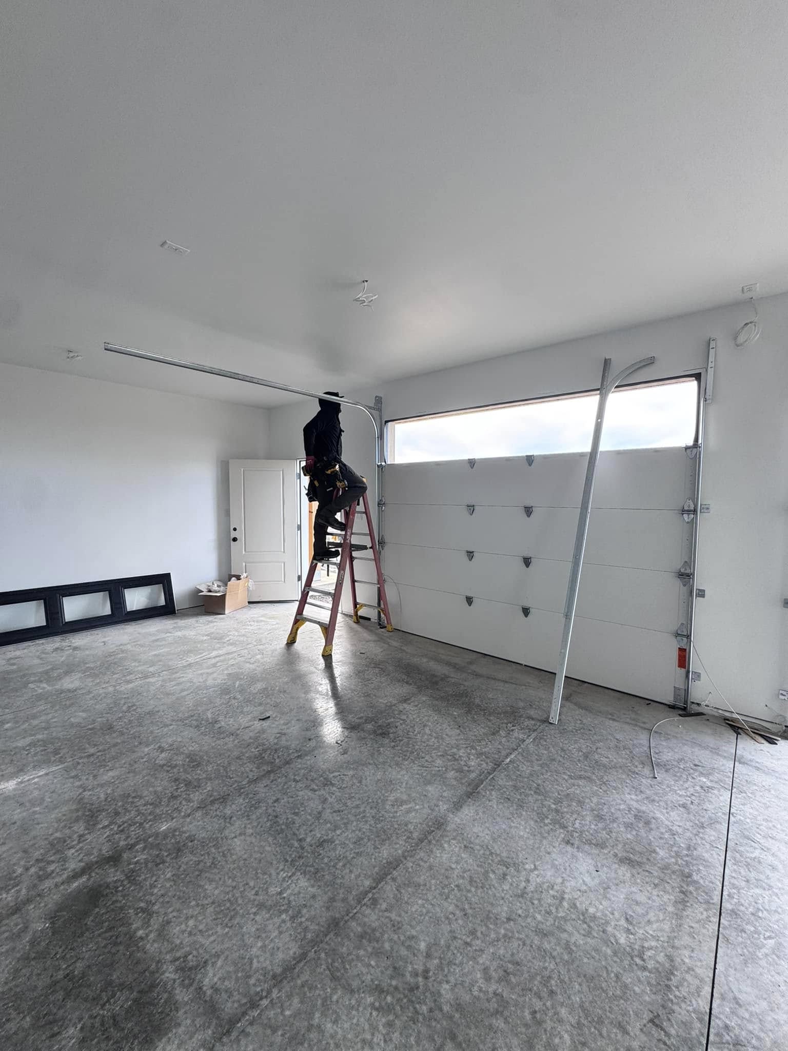 guys installing a garage door